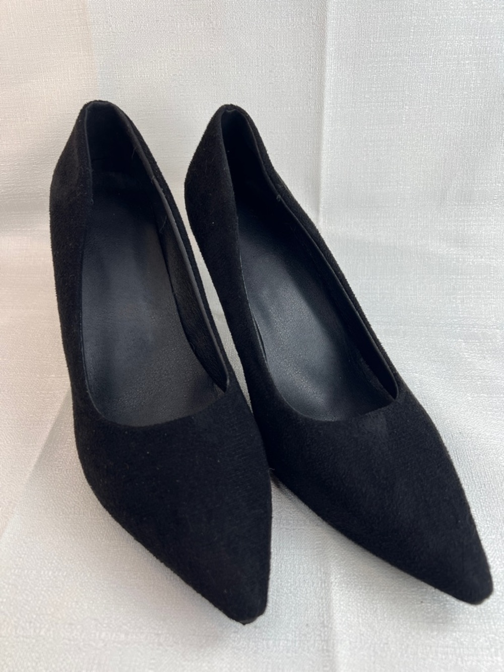 Black, man-made suede heels
